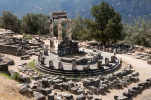 Ancient greek ruins of Delphi with wooded landscape